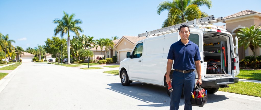 Licensed Gold Plumbing Hialeah plumber with service van in Hialeah Florida residential neighborhood